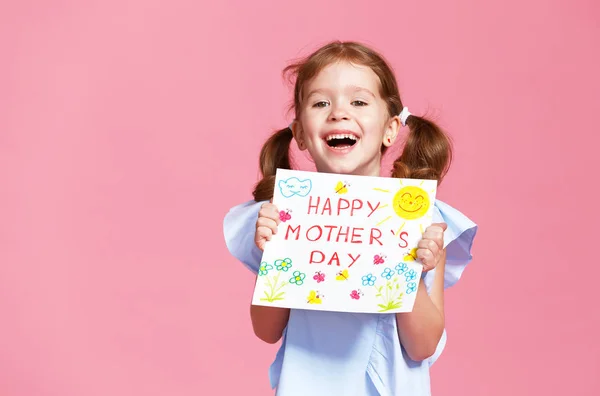 Concept of mother's day. cheerful laughing child girl with postc — Stock Photo, Image