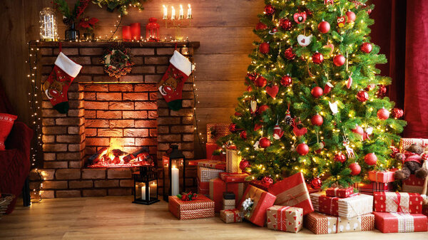 interior christmas. magic glowing tree, fireplace, gifts in  dar