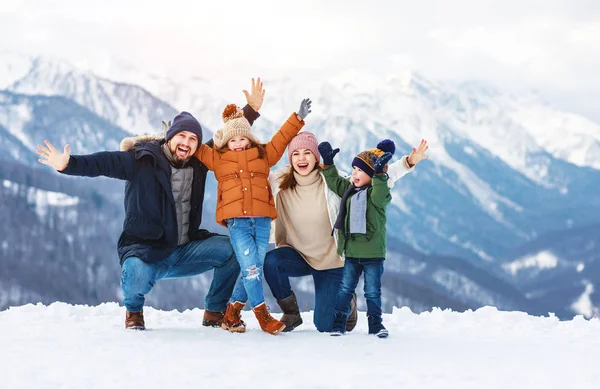 Happy family mother father and children on winter nature — 스톡 사진