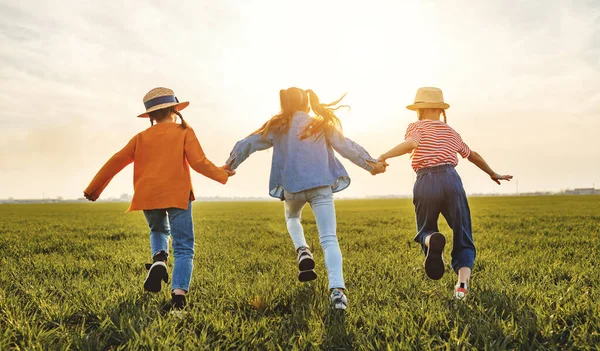 Unrecognizable Cheerful Little Girls Casual Clothes Having Fun Running Back — Stock Photo, Image