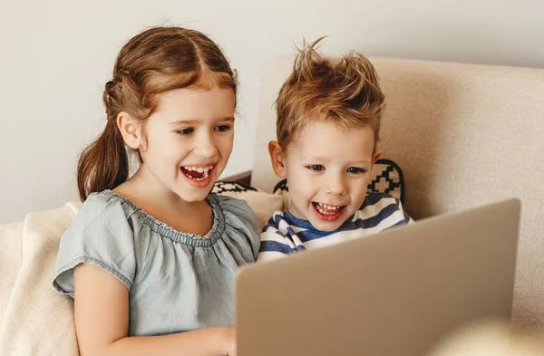 Cheerful Little Girl Boy Laughing While Spending Time Laptop Playing — ストック写真