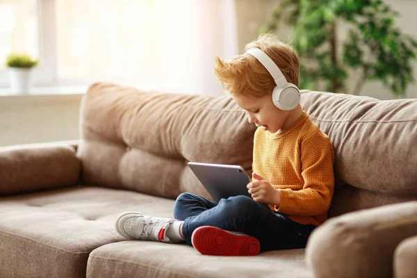 Full Body Delighted Little Boy Headphones Smiling Watching Interesting Cartoon — Stock Photo, Image