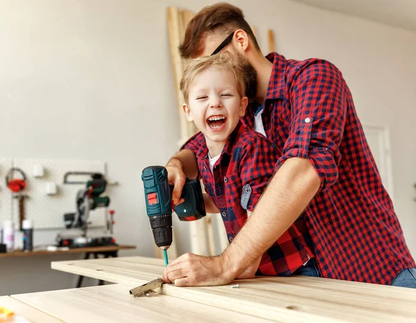 Excited Little Boy Young Father Similar Shirts Holding Drill Together — Stock Photo, Image