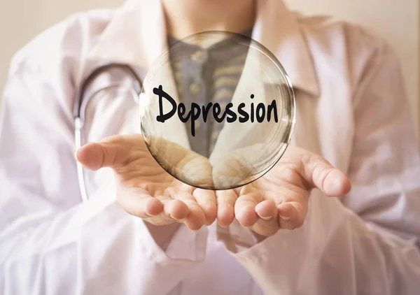 woman doctor holding a transparent bubble with depression text, depression concept