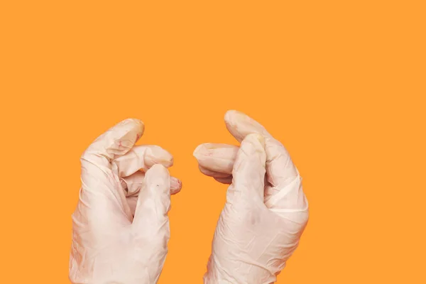 Hands Wearing Protective Medical Gloves Isolated Orange Background — Stock Photo, Image