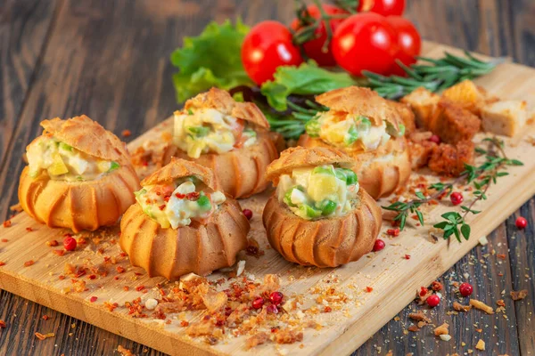 Profiteroles with vegetable filling, tomatoes and herbs — Stock Photo, Image