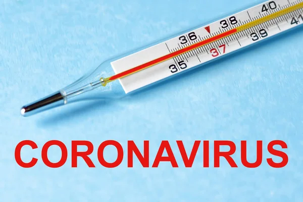A thermometer for measuring body temperature for fever symptoms, the concept of coronavirus