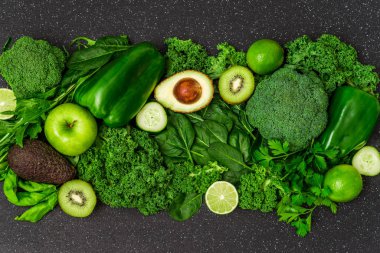 Selection of healthy green food fresh vegetables and fruit.