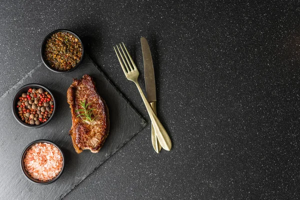 New york strip loin beef steak meat with chimichurri sauce. — Stock Photo, Image