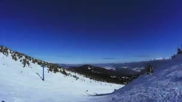 Snow-covered slope and ate — Stock Video