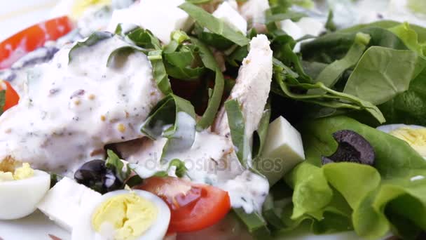 Assorted salad on lettuce leaves — Stock Video