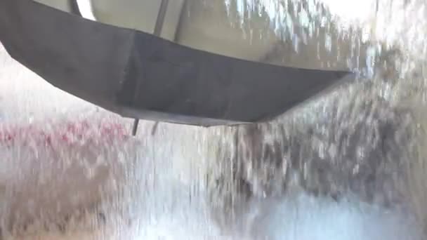Iron umbrella and water — Stock Video