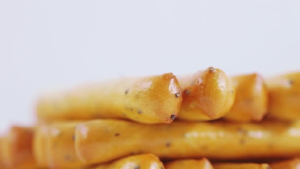 Biscuit sticks with poppy seeds — Stock Video