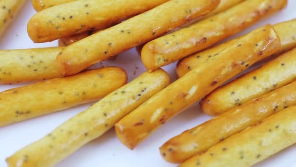 Palitos de galletas con semillas de amapola — Vídeos de Stock