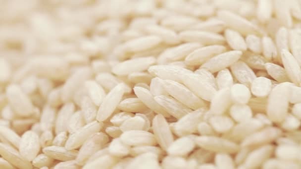 Bruine rijst in bulk — Stockvideo