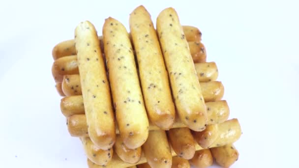 Palitos de galletas con semillas de amapola — Vídeo de stock