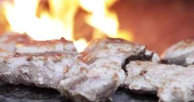 Cooking meat in grill bbq