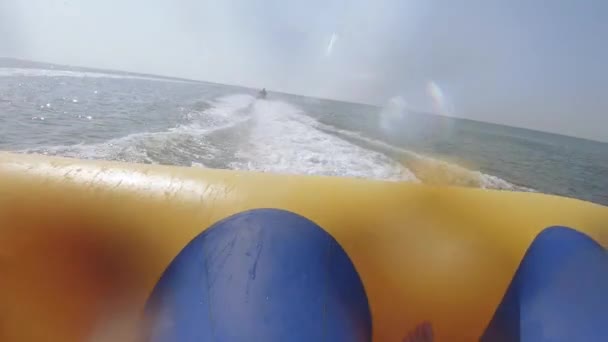 Riding on an inflatable attraction — Stock Video