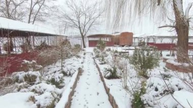 Snow-covered summer cafe