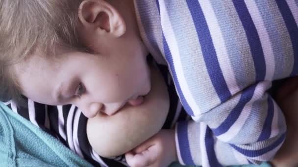 A boy eats milk at home — Stock Video