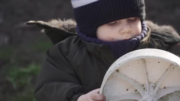 Boy in played wheel — Stok Video