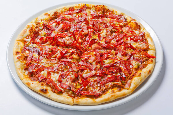 Pizza with Pepperoni Sausage and Bacon.