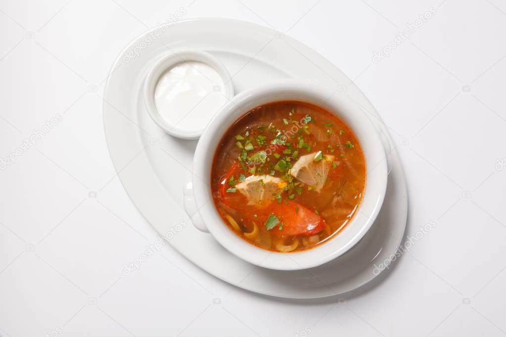 Homemade meat soup, Solyanka or saltwort.