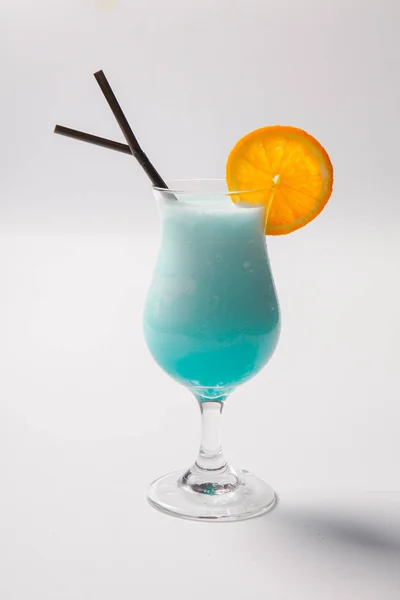 blue Hawaiian cocktail with a slice of orange