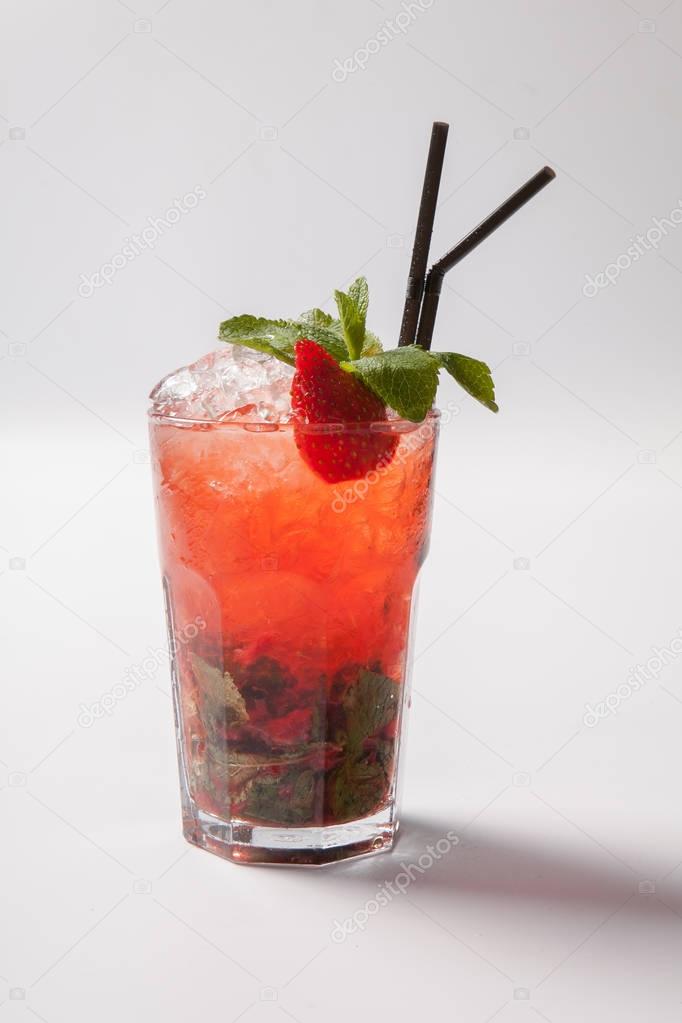 Mojito strawberry cocktail. closeup isolated on white background.