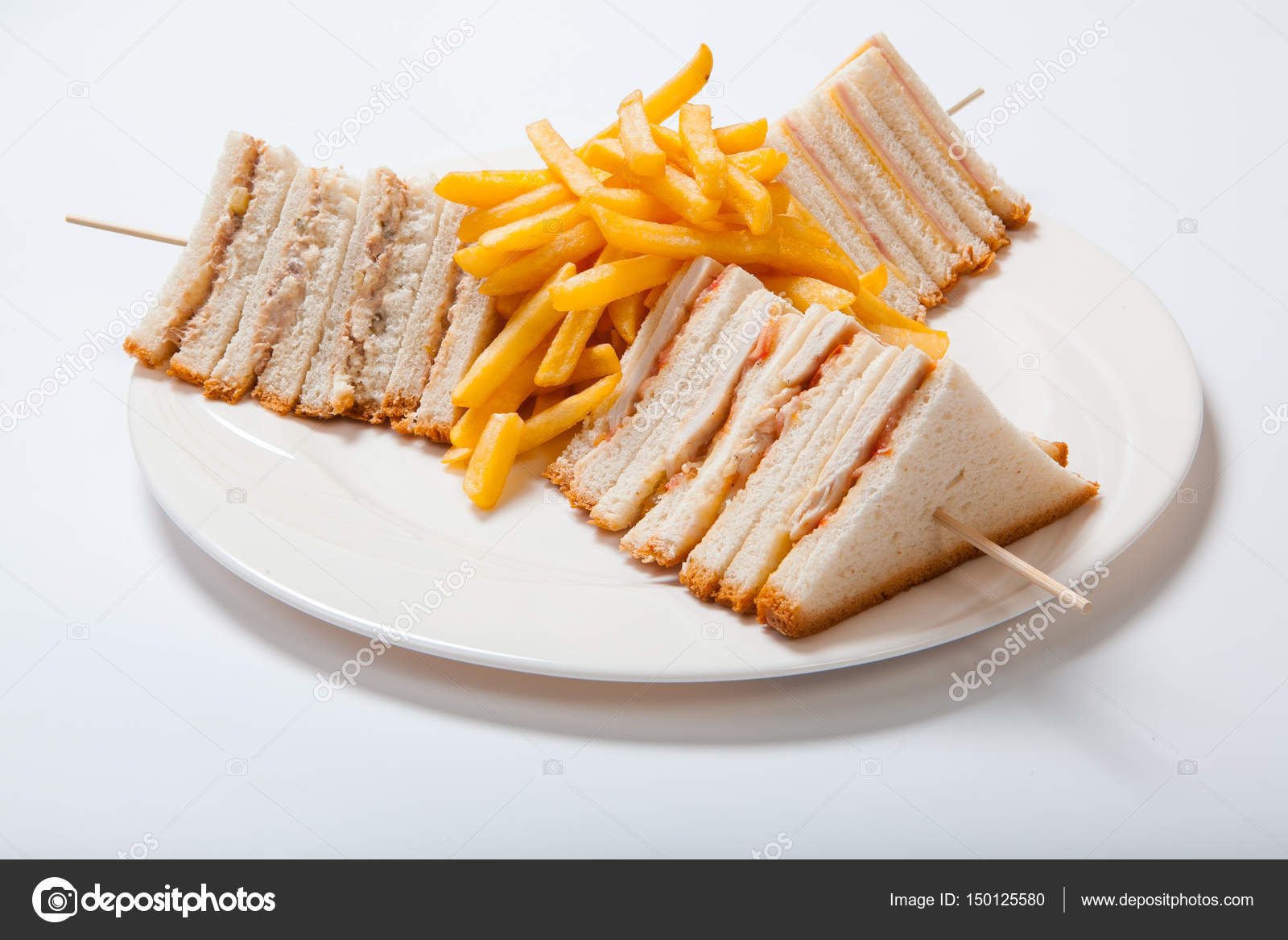 different types of sandwiches with french fries on a white types of sandwiches