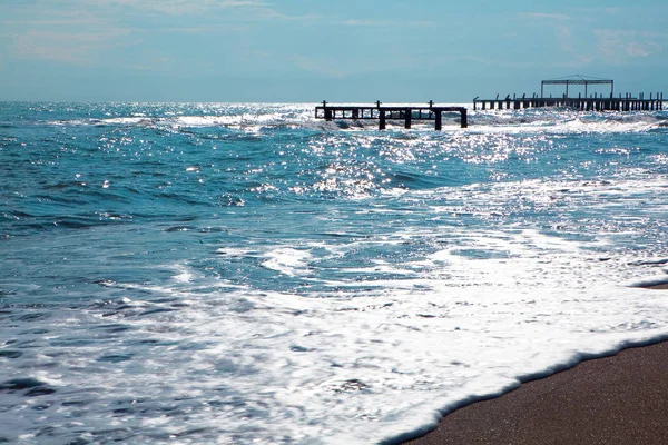 gündoğumu zaman Beach'te. Günbatımı vasıl belgili tanımlık kıyı