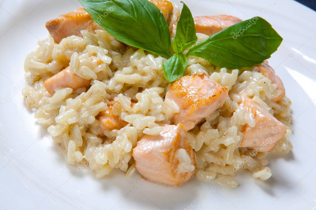Risotto with salmon in a mild creamy sauce
