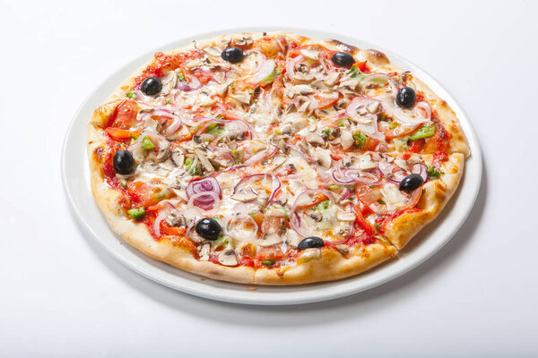 Pizza with onion and ham, cheese and tomato. White background