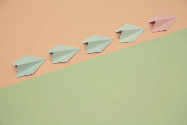 Leadership mockup. Business development. Increase income. Blank colourful paper airplanes take off. Place for text