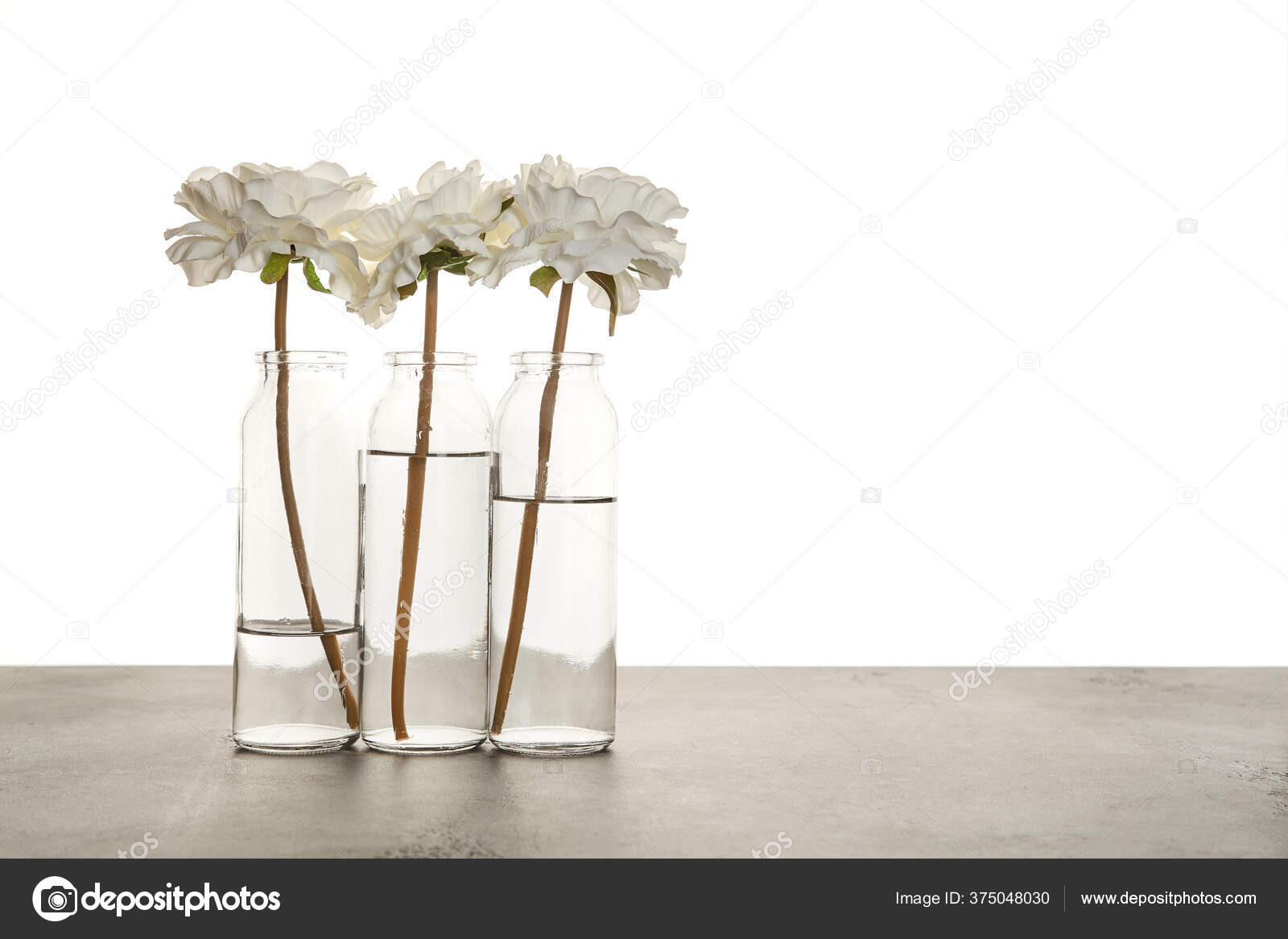 Set of vases with nice flowers on light background. Decorative element