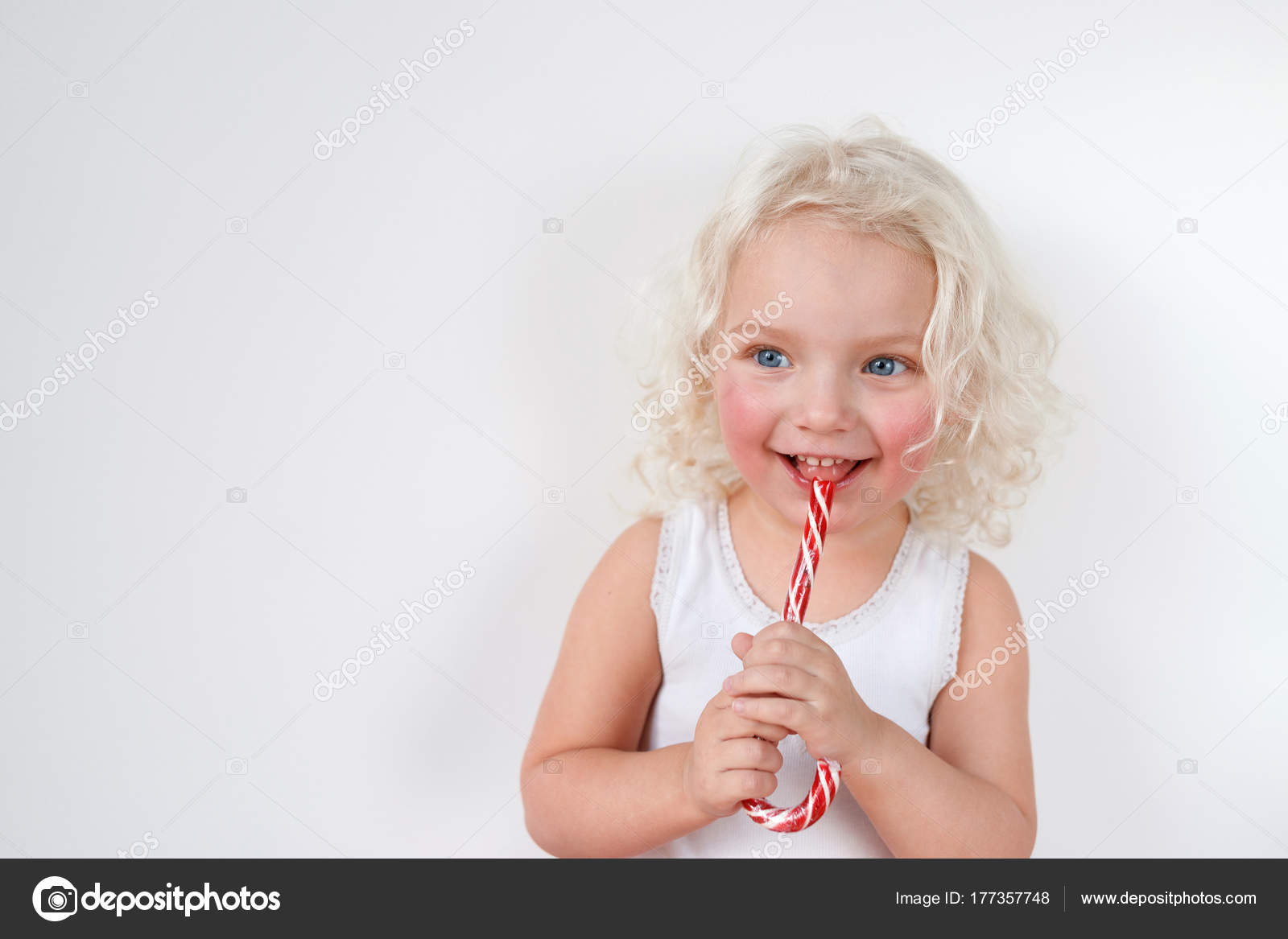 Curly Blonde Blue Eyed Attractive Girl Wears Casual White T Shirt