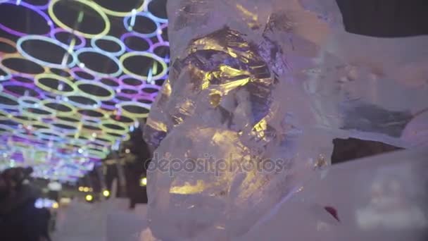 Icy sculpture of frozen Woodman or man with beard in winter city. Ice Sculptures in Russia. Sculptures In The Ice town. Ice Sculpture and Beautiful Snows Falls — Stock Video