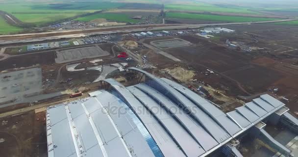 Aerial view of the modern international airport terminal. Traveling around the world. Empty airport aerial. View of runway at the airport. Airfield marking on taxiway is heading to runway — Stock Video