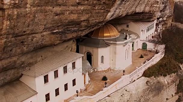 Holy Annunciation Monastery Mangupsky. The temple inside the cave. Medieval fortress Mangup Kale. Bakhchisarai State Historical and Cultural Reserve. Crimea. Ukraine. — Stock Video