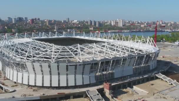 Aerial view on construction and reconstruction of football stadium. Reconstruction of stadium to host matches of world football championship in 2018. Russia. Construction company builds a stadium — Stock Video