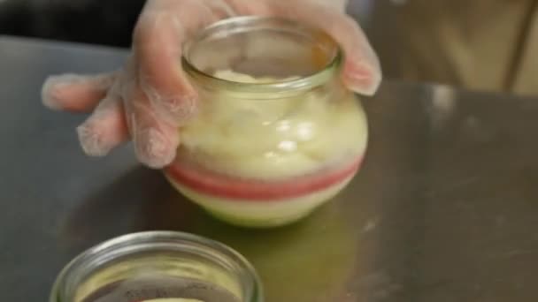 Sweet cream in a mason jar. Churning of Sweet cream in a glass jar — Stock Video