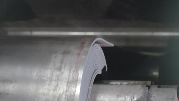 Metal tape is moving on rolling machine close-up. Rolling sheet rolling mill — Stock Video