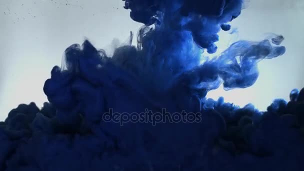 Blue color paint pouring in water. Acrylic colors and ink in water. Abstract frame background. Colors and ink in water — Stock Video