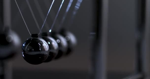 Newtons cradle physics concept for action and reaction or cause and effect. Balls Newton — Stock Video