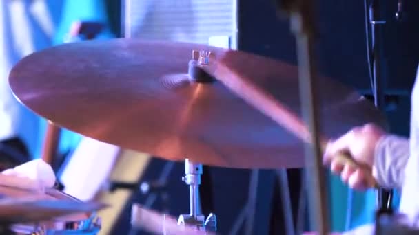 The drum stick hit on the crash cymbal in the low key. Drummer hits the cymbals — Stock Video