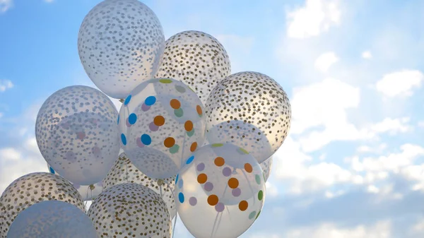 Beyaz balon gökyüzüne karşı. Beyaz topları gökyüzündeki