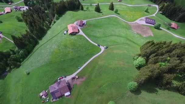 Mountain Village on a Sunny Summer day. Footage. Village in the mountains. Aerial — Stock Video