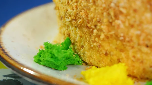 Beautiful honey cake decorated with bees of cream. Beautiful honey cake, closeup