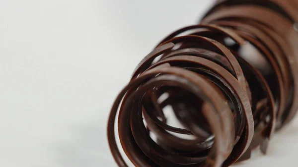Sweet tubes - dessert. Chocolate tube for decoration, closeup. — Stock Photo, Image