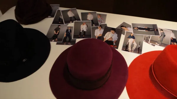 Collection of fashion hats on the table. Collage with different hats. — Stock Photo, Image